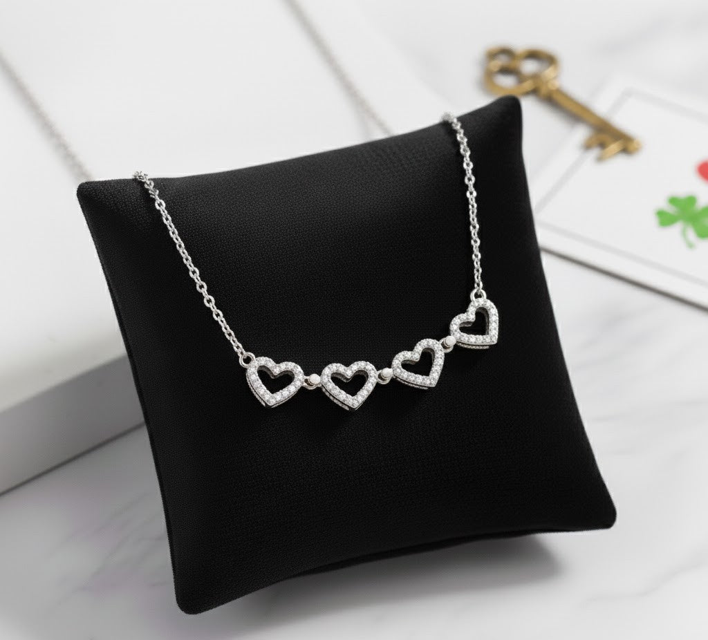 Collar Trébol Magnético 2 en 1 - Corazones de Acero y Zirconitas